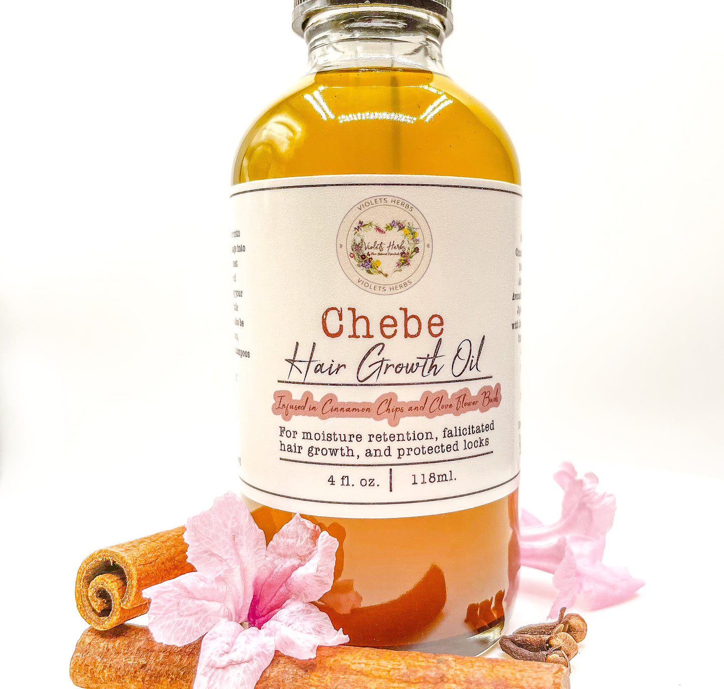 Pure Natural Chebe Hair Growth and Thickening Oil Treatment infused in Chebe Powder Essential Oils and Locally Grown Herbs