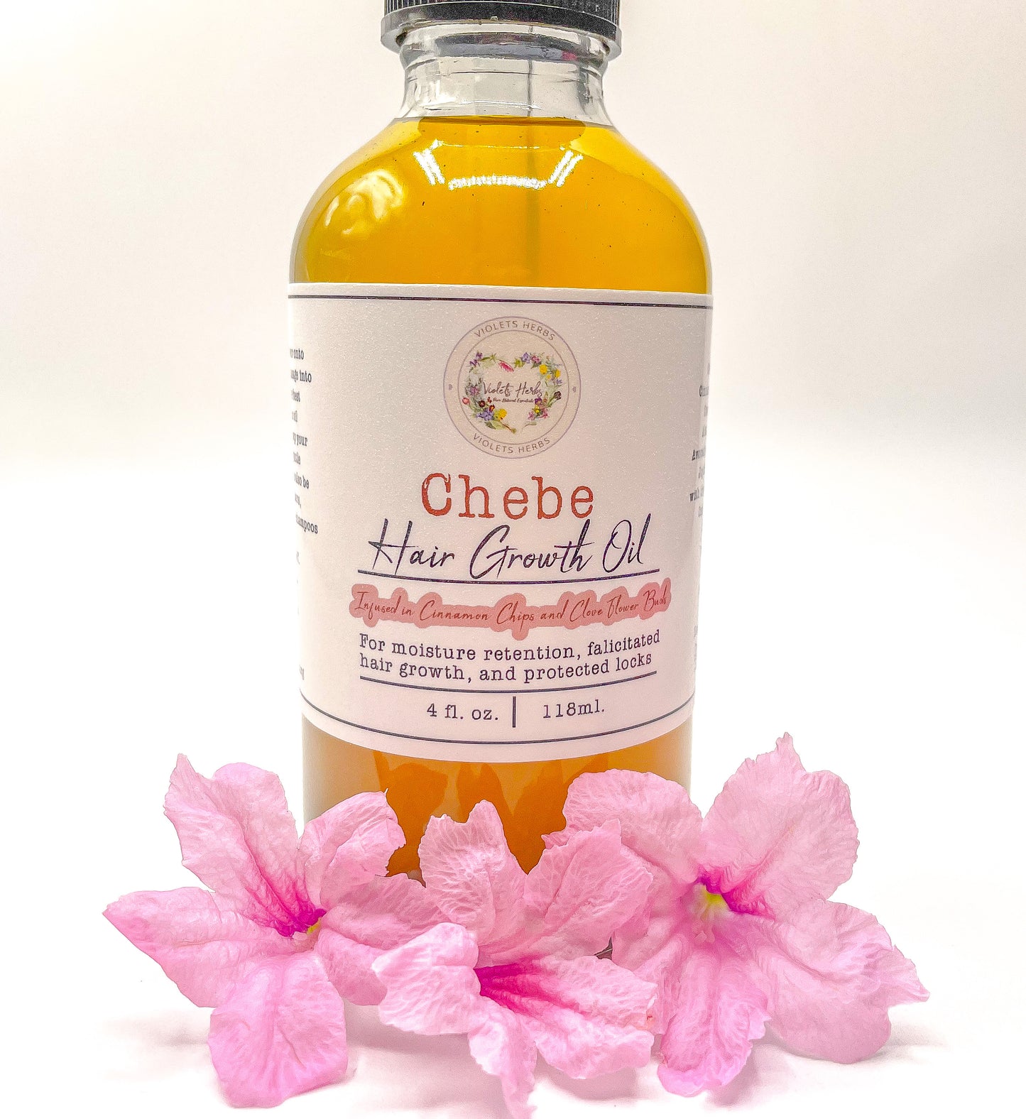 Pure Natural Chebe Hair Growth and Thickening Oil Treatment infused in Chebe Powder Essential Oils and Locally Grown Herbs